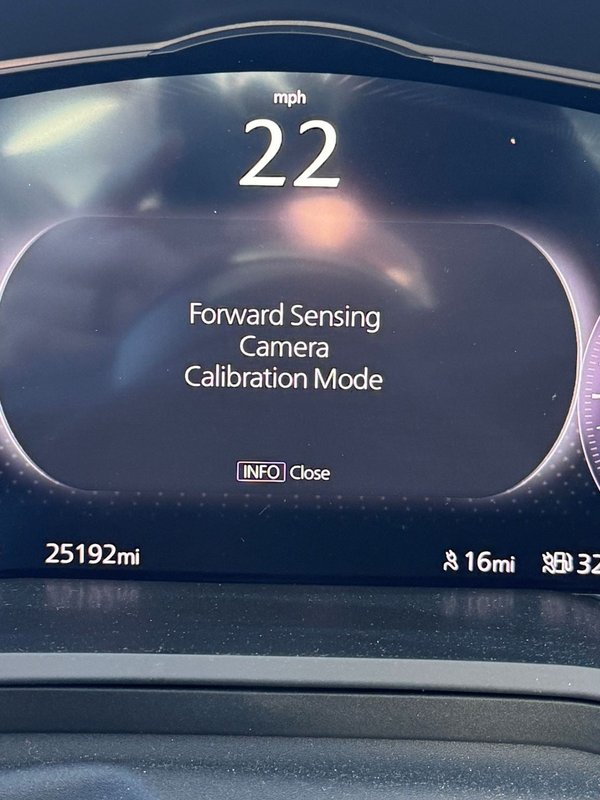 Dashboard cluster reading Forward Sensing Camera Calibration Mode during an ADAS calibration in Colorado Springs