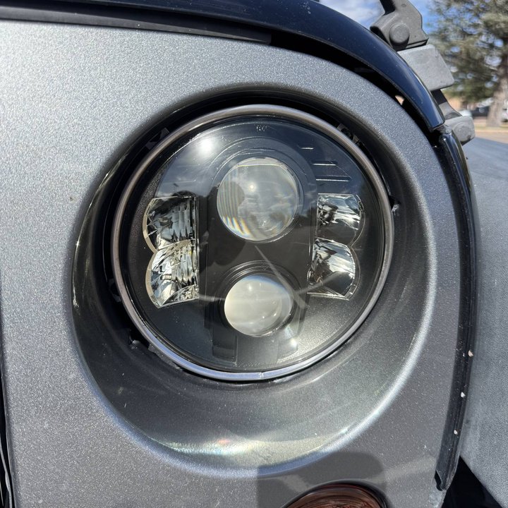 Restored projector headlight polished to factory clarity by Shattered Vision Auto Glass in Colorado Springs