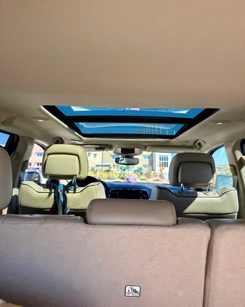 Interior view of a newly installed panoramic sunroof in a Colorado Springs SUV