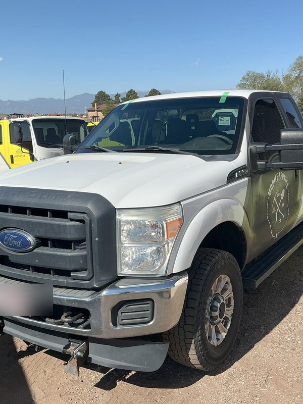 Utility service truck after windshield replacement in Colorado Springs