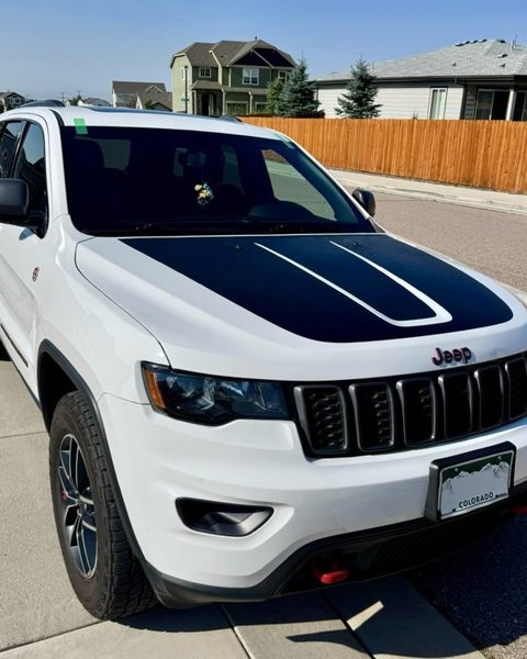 White Jeep Grand Cherokee after windshield replacement in Colorado Springs